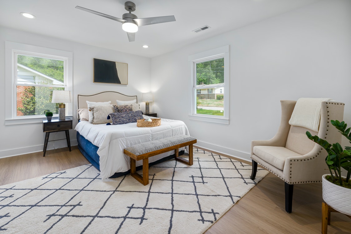 A view of a bedroom - The Advantages of Hiring a Home Designer 