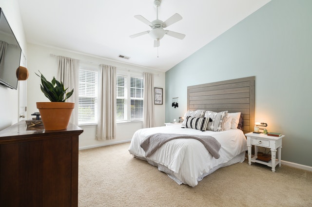 Bedroom with complete linens - The Advantages of Hiring a Home Designer 