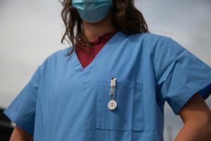 nurse wearing blue scrub suit 300x200 - nurse wearing blue scrub suit