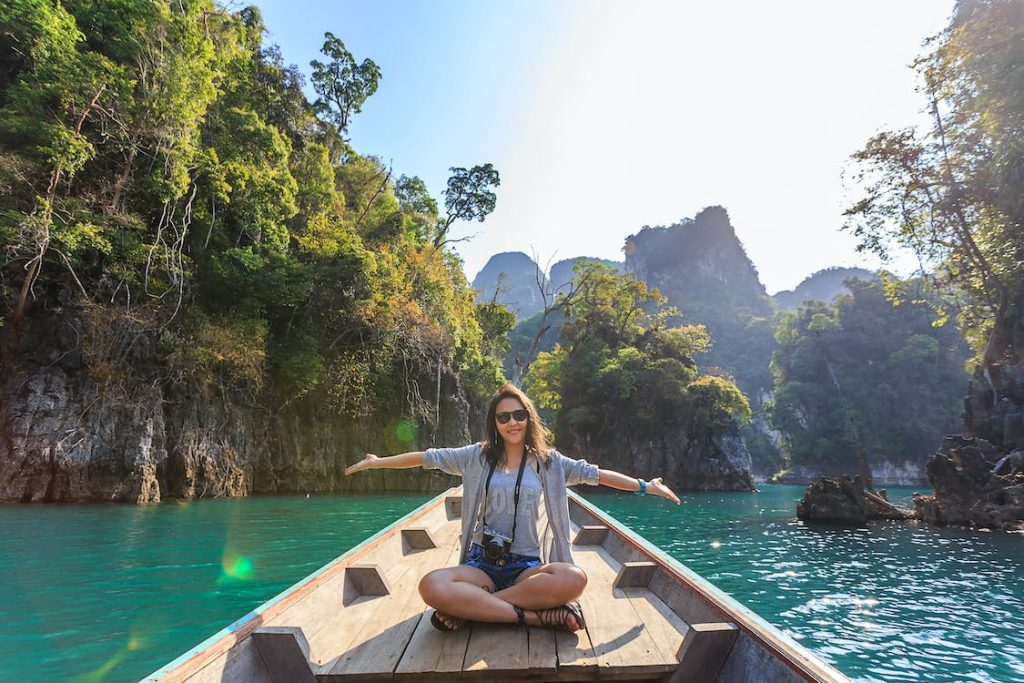 woman in the middle of a lake 1024x683 - The Ultimate Checklist for Every Type of Traveler
